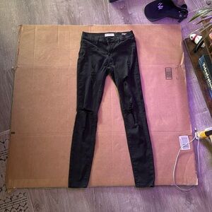 Packing Black Ripped Jeggings. Size 25
